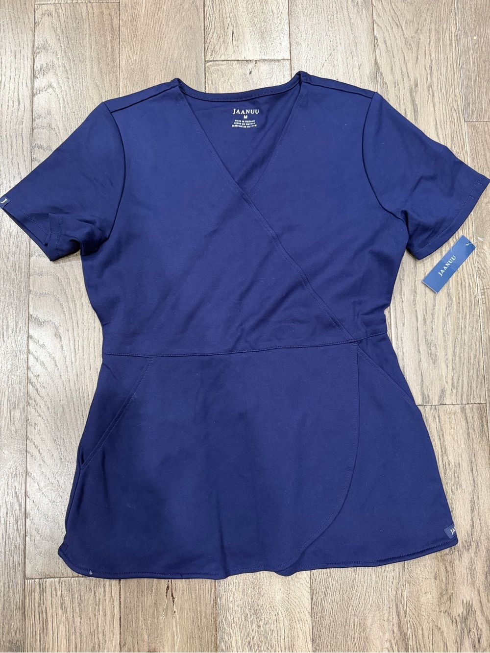 Jaanuu Women's Wrap-Front Scrub Top in Navy Blue